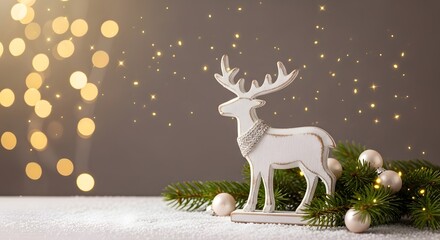 Christmas reindeer decoration with lights and ornaments on snow