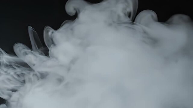Ethereal smoke clouds against darkness