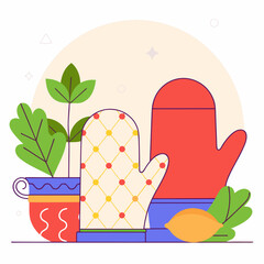 Two oven mitts with a plant and a lemon