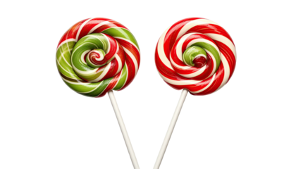 Two colorful, swirled lollipops on sticks against black