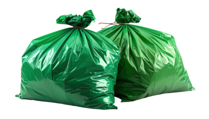 Two tied green garbage bags, isolated on a black background