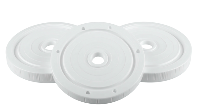 Three white circular lids, stacked and staggered on black