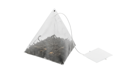 Pyramid tea bag filled with loose leaf tea.