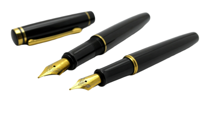 Two black fountain pens with gold trim, one uncapped