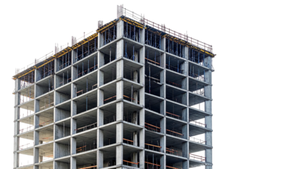 Unfinished concrete skyscraper under construction, open-air design