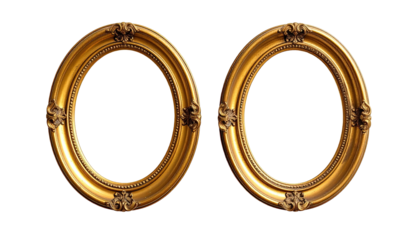 Two golden, ornate, oval picture frames on a black background