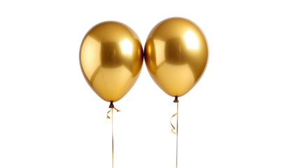 Two shiny golden balloons float, isolated on a black background
