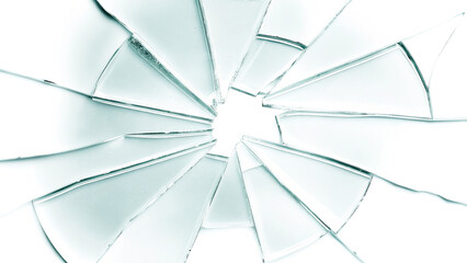 Broken glass on white background texture concept. Fragmented glass pieces creating an abstract, modern aesthetic.