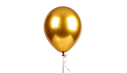 Shiny, metallic gold balloon floats against stark black backdrop