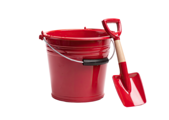 A bright red metal bucket with a wire handle and a matching shovel placed next to it