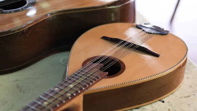 The strings of handcrafted mandolin have rusted from the humidity.