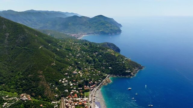 Aerial pull back shot of the Levanto town and Bonassola, in sunny Liguria, Italy