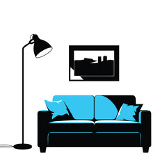 Modern black sofa with bright blue cushions and pillows, next to a black floor lamp, with a framed abstract artwork on a white wall