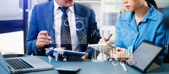 Team colleagues wear formal attire to work together to optimize business processes by using new technologies. high tech hologram in office background