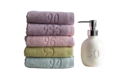 Clean white towel with natural handmade soap bar, spa hygiene bath accessories for freshness and skincare isolated on white background