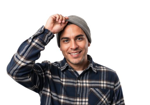 Smiling man wearing beanie and plaid shirt poses cheerfully against white background