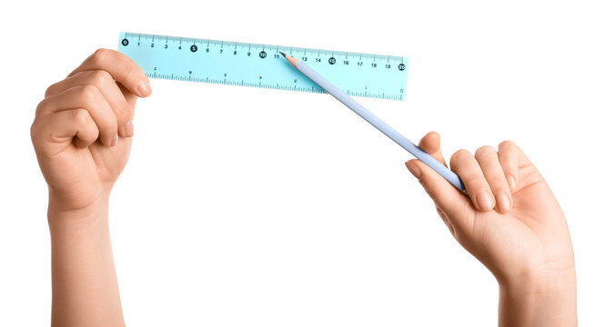 Female hands with ruler and pencil on white background - Powered by Adobe