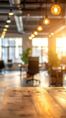 Fototapeta premium An office interior with a wooden table and blurred background sunlight