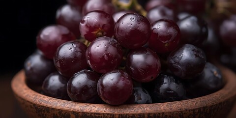 Fresh Purple Grapes in Wooden Bowl