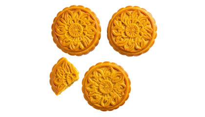 Mooncakes with ornate floral patterns against a black backdrop
