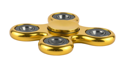 Gold-colored fidget spinner toy, black background