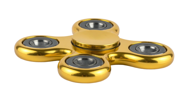 Gold-colored fidget spinner toy, black background