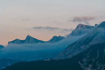 Mountain Range with Clouds at Sunrise