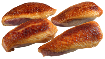 Four raw meat pieces are displayed on a surface these individual meat portions await culinary preparation