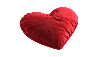 Red heart pillow isolated on black, soft and plump