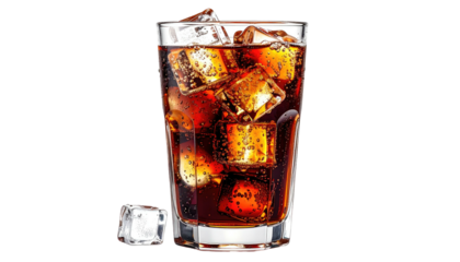 Fizzy cola drink with ice cubes in glass against black