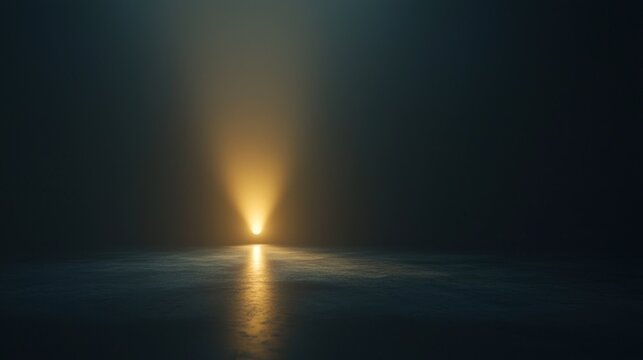 A tiny glowing speck of light hovering in a pitch black room drawing attention to the smallest detail