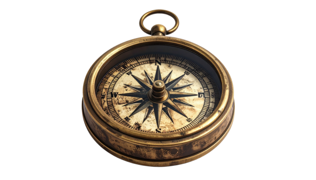 Antique brass compass with ornate star on a black backdrop