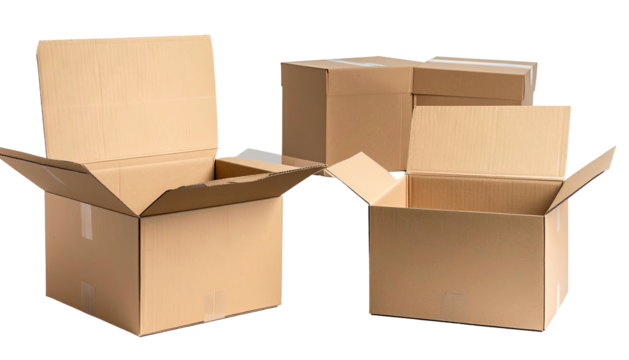 Unpacked brown cardboard boxes on black background, some open