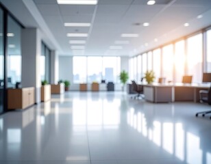 Blurred, modern office space with desks and city views