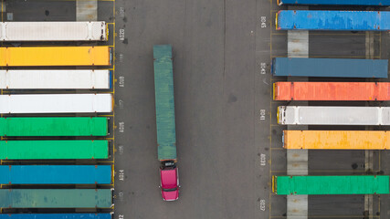 Aerial top down view of Colorful containers and Semi truck at Container yard in Portland, Oregon. © SNEHIT PHOTO