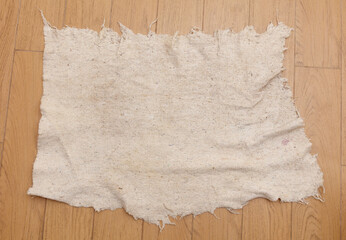 A piece of cloth is laying on the floor