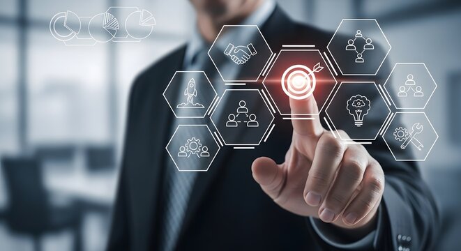 Businessman touching a hexagonal interface with business icons