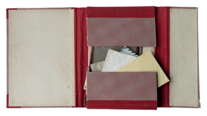 open red file folder with antique paper envelopes inside on white