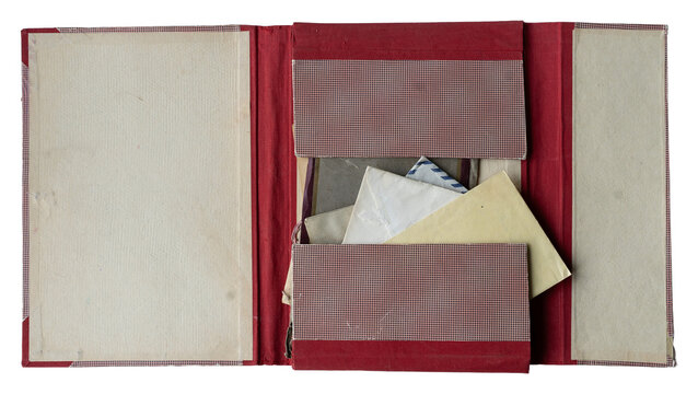 open red file folder with antique paper envelopes inside on white
