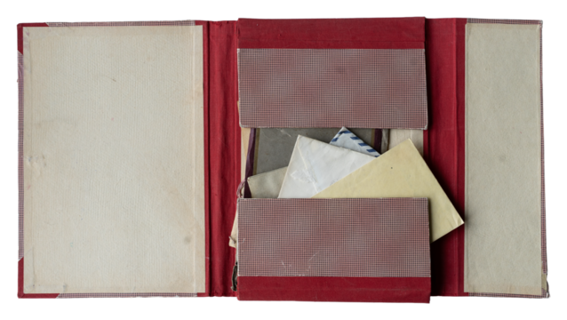 open red file folder with antique paper envelopes inside on white