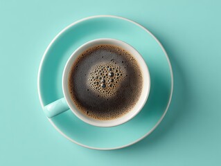 top-down overhead view of a cup of black coffee with a smooth crema ring and tiny bubbles
