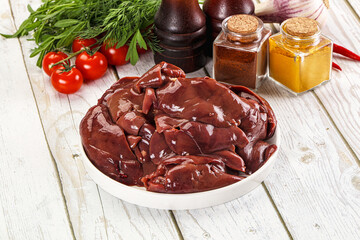 Raw chicken liver uncooked in the bowl