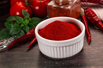 Spicy dry paprika powder in the bowl
