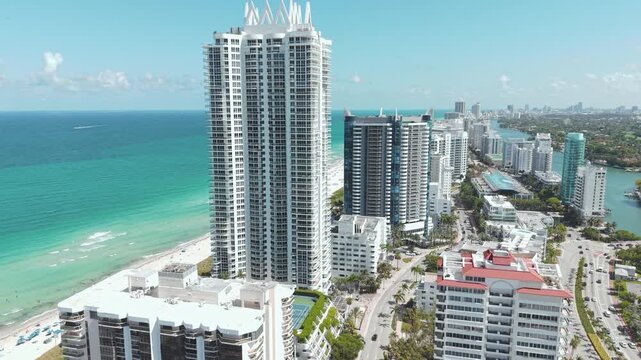 Aerial View of Miami Beach, Florida USA. Beachfront Condominium Towers and Traffic, Drone Shot