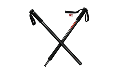 Crossed black hiking poles, neutral background, sporty, adventure