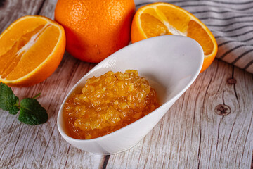 Sweet orange jam in the bowl