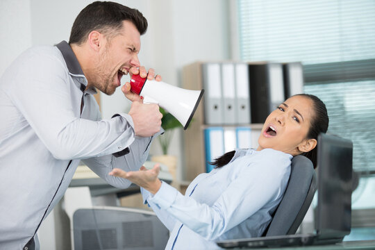 office conflict between man and woman - Powered by Adobe