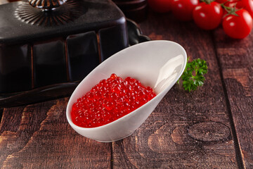 Salmon red caviar in the bowl