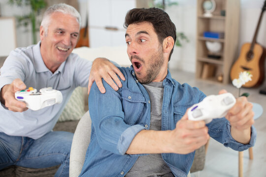 animated men playing computer game