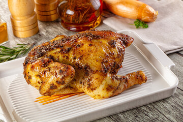 Baked in oven whole chicken with spices